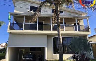 Imagem: A casa em condomínio possui 3 Dormitórios, 2 Banheiros, 2