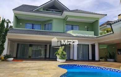 Imagem: A casa em condomínio possui 5 Dormitórios, 5 Banheiros, 4