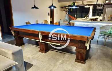 Imagem: A casa possui 3 Dormitórios, 1 Banheiro, 2 Vagas na garagem