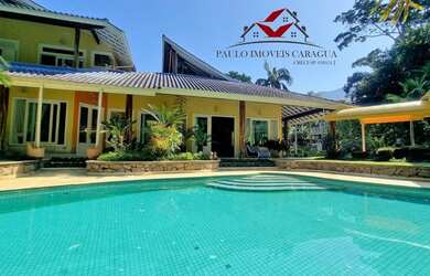 Imagem: A casa em condomínio possui 4 Dormitórios, 2 Banheiros, 3