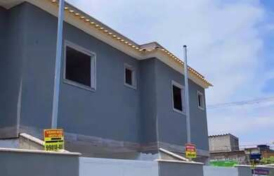 Imagem: A casa possui 2 Dormitórios, 3 Banheiros, 1 Vaga na garagem