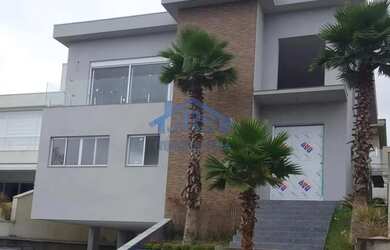 Imagem: A casa em condomínio possui 4 Dormitórios, 5 Banheiros, 5