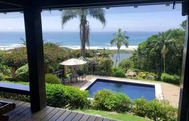 Imagem: A casa possui 4 Dormitórios, 2 Banheiros, 6.000m² de Área