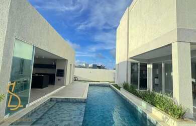 Imagem: A casa em condomínio possui 5 Dormitórios, 5 Banheiros, 2