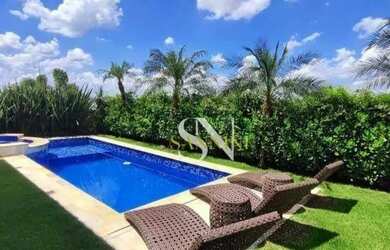 Imagem: A casa em condomínio possui 4 Dormitórios, 5 Banheiros, 3