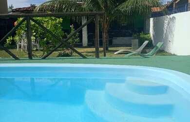 Imagem: A casa possui 3 Dormitórios, 3 Banheiros, 3 Vagas na garagem