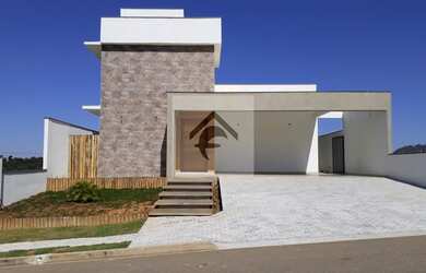 Imagem: A casa possui 3 Dormitórios, 3 Banheiros, 4 Vagas na garagem