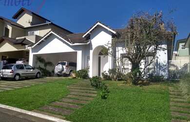 Imagem: A casa em condomínio possui 4 Dormitórios, 5 Banheiros, 2