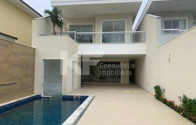 Imagem: A casa em condomínio possui 5 Dormitórios, 4 Banheiros, 336m²