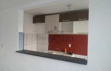 Imagem: O apartamento possui 2 Dormitórios, 1 Banheiro, 1 Vaga na garagem