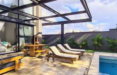 Imagem: A casa em condomínio possui 4 Dormitórios, 5 Banheiros, 5