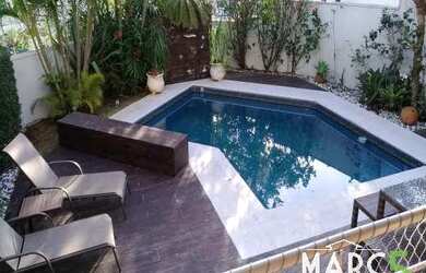 Imagem: A casa em condomínio possui 3 Dormitórios, 5 Banheiros, 4