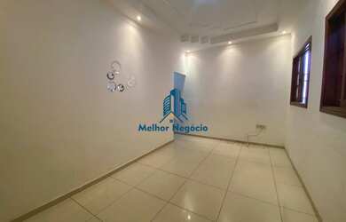 Imagem: A casa possui 3 Dormitórios, 3 Banheiros, 4 Vagas na garagem