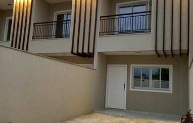 Imagem 1: Lindo sobrado com 2 suítes e vaga para 2 carros na garagem em Porto Belo