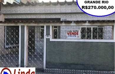 Imagem: A casa possui 3 Dormitórios, 2 Banheiros, 2 Vagas na garagem