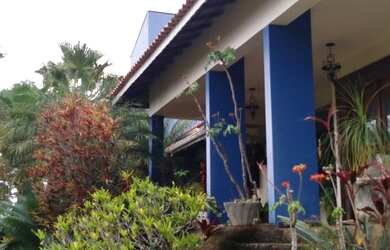 Imagem: A casa em condomínio à venda possui 5 Dormitórios, 5 Banheiros