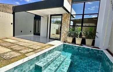 Imagem: A casa possui 3 Dormitórios, 4 Banheiros, 2 Vagas na garagem