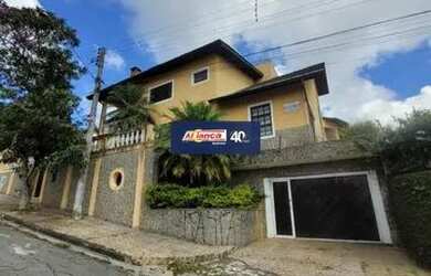 Imagem: A casa possui 5 Dormitórios, 4 Banheiros, 4 Vagas na garagem