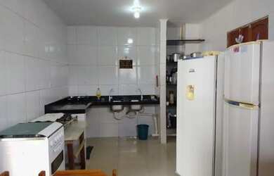 Imagem: A casa possui 3 Dormitórios e 4 Vagas na garagem e está localizado