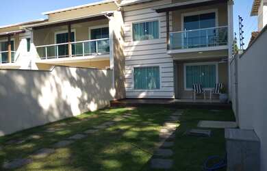 Imagem: A casa possui 3 Dormitórios, 4 Banheiros, 4 Vagas na garagem