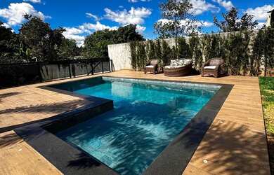 Imagem: A casa em condomínio possui 4 Dormitórios, 5 Banheiros, 5