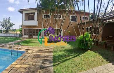 Imagem: A casa possui 5 Dormitórios, 5 Banheiros, 5 Vagas na garagem