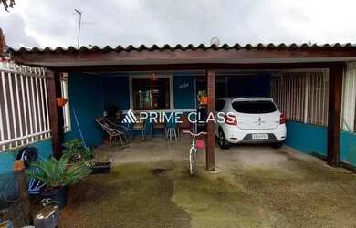 Imagem: A casa possui 3 Dormitórios, 1 Banheiro, 1 Vaga na garagem