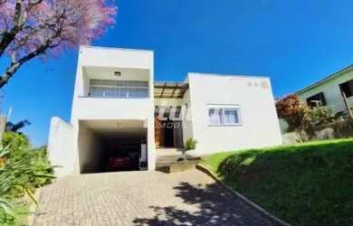 Imagem: A casa para alugar possui 3 Dormitórios, 4 Banheiros, 2 Vagas