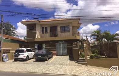 Imagem: A casa possui 2 Dormitórios, 2 Banheiros, 3 Vagas na garagem