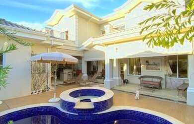 Imagem: A casa em condomínio possui 3 Dormitórios, 5 Banheiros, 4