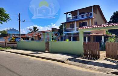 Imagem: A casa possui 4 Dormitórios, 3 Banheiros, 4 Vagas na garagem