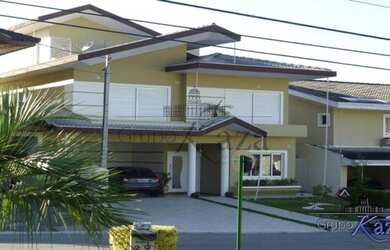 Imagem: A casa em condomínio possui 4 Dormitórios, 5 Banheiros, 4