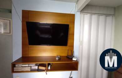 Imagem: O apartamento possui 2 Dormitórios, 1 Banheiro, 1 Vaga na garagem