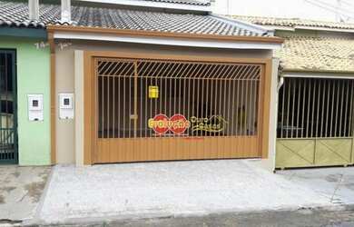 Imagem: A casa possui 3 Dormitórios, 2 Banheiros, 2 Vagas na garagem