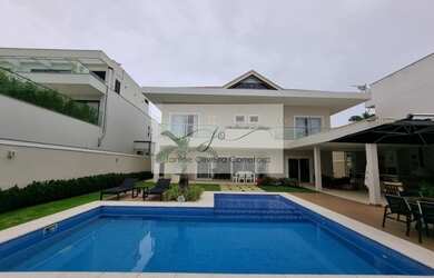 Imagem: A casa em condomínio possui 5 Dormitórios, 5 Banheiros, 4