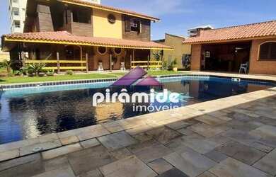 Imagem: A casa possui 5 Dormitórios, 2 Banheiros, 5 Vagas na garagem