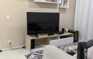 Imagem: O apartamento possui 2 Dormitórios, 1 Banheiro, 1 Vaga na garagem