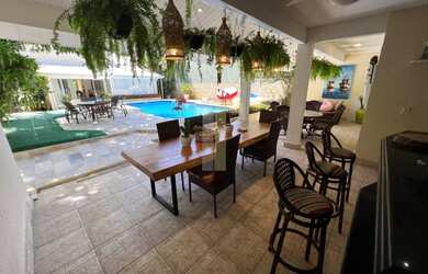 Imagem: A casa em condomínio possui 5 Dormitórios, 5 Banheiros, 3