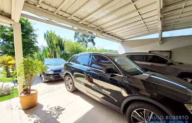 Imagem: A casa em condomínio possui 5 Dormitórios, 5 Banheiros, 5