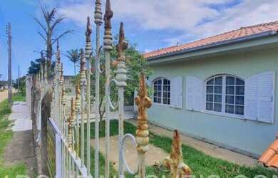 Imagem: A casa possui 4 Dormitórios, 2 Banheiros, 1 Vaga na garagem