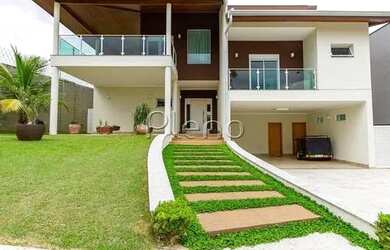 Imagem: A casa em condomínio possui 3 Dormitórios, 2 Banheiros, 4