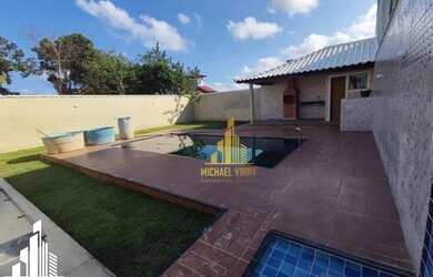 Imagem: A casa possui 3 Dormitórios, 2 Banheiros, 1 Vaga na garagem