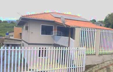 Imagem: A casa possui 5 Dormitórios, 4 Banheiros, 3 Vagas na garagem