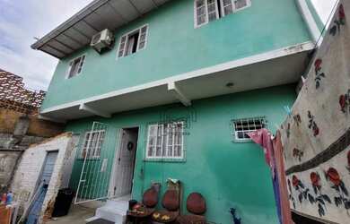 Imagem: A casa possui 3 Dormitórios, 2 Banheiros e 90m² de Área e