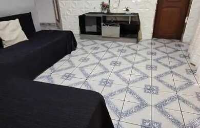 Imagem: A casa possui 3 Dormitórios, 2 Banheiros, 2 Vagas na garagem