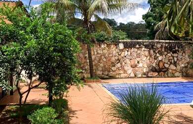 Imagem: A casa possui 3 Dormitórios, 5 Banheiros, 5 Vagas na garagem