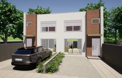 Imagem: A casa possui 2 Dormitórios, 3 Banheiros, 2 Vagas na garagem