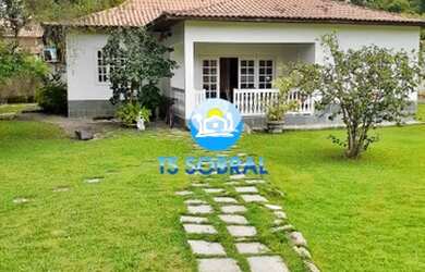 Imagem: A casa e possui 3 Dormitórios, Suítes, 2 Banheiros, 2 Vagas