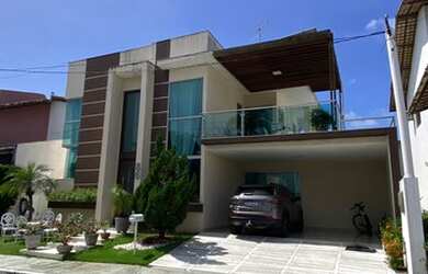 Imagem: A casa possui 5 Dormitórios, 5 Banheiros, 2 Vagas na garagem