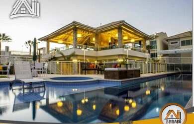 Imagem: A casa em condomínio possui 4 Dormitórios, 4 Banheiros, 2